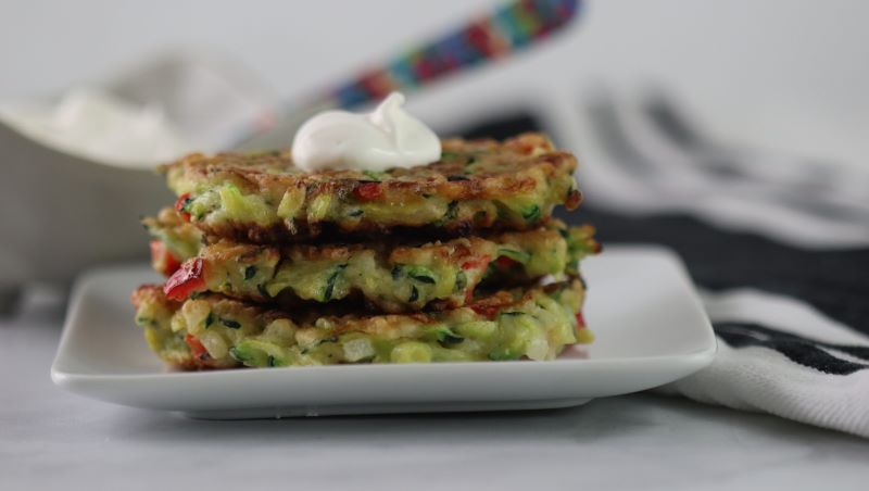Zucchini fritters with sour cream